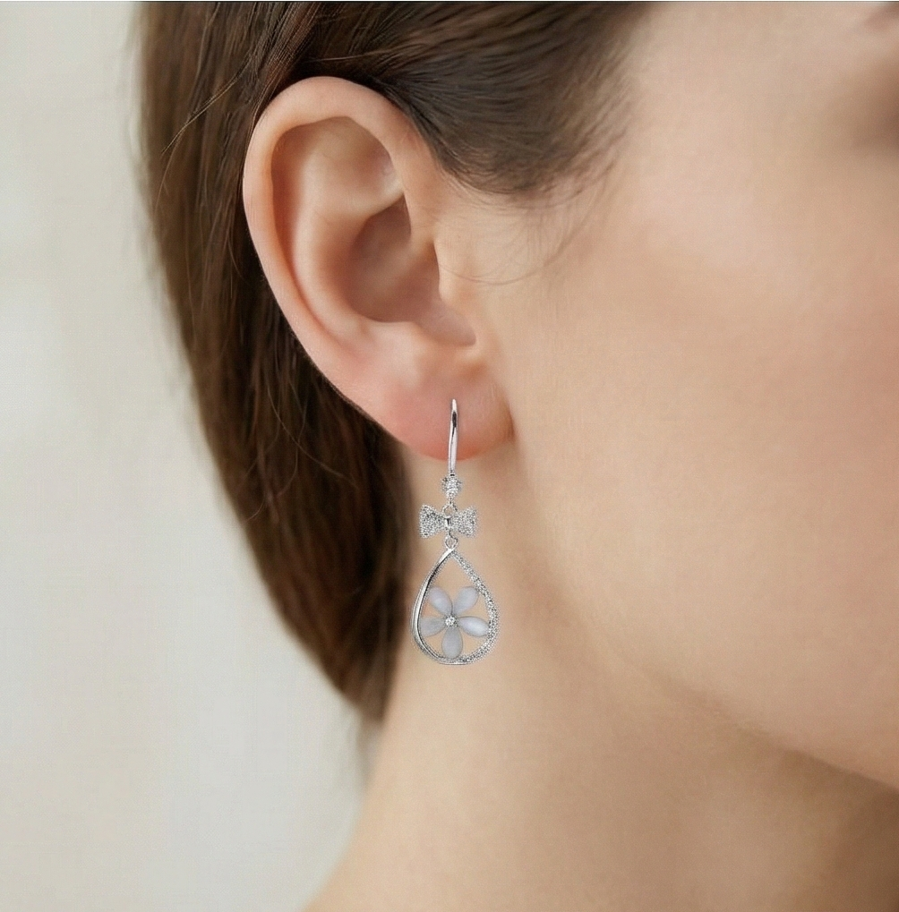 925 Sterling Silver Floral Teardrop Earrings with Bow Detail High Polish Rhodium Jewellery