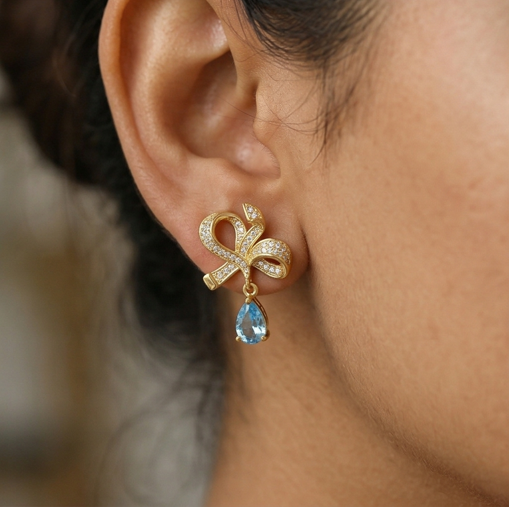 Graceful Bow Light Blue Drop Earrings in 925 Sterling Silver with Gold Finish - Chic Women's Jewellery