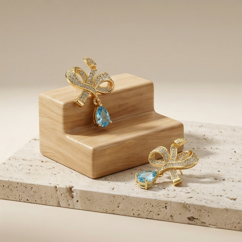 Graceful Bow Light Blue Drop Earrings in 925 Sterling Silver with Gold Finish - Chic Women's Jewellery